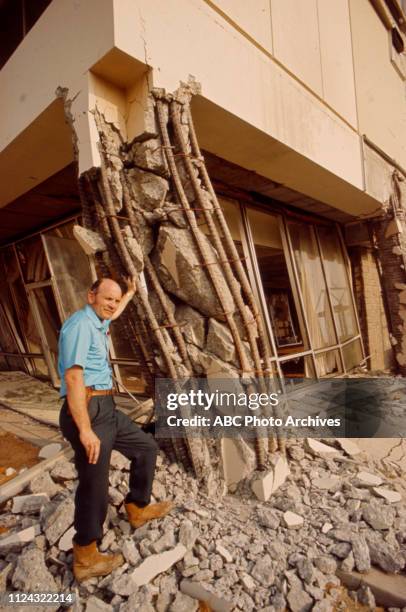 Los Angeles, CA Dr F Beach Leighton examining earthquake damage at the Olive View Medical Center in the aftermath of the Sylmar Earthquake / 1971 San...