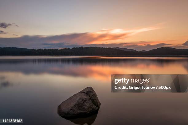 magnificent long exposure lake sunset - grand etang lake stock pictures, royalty-free photos & images