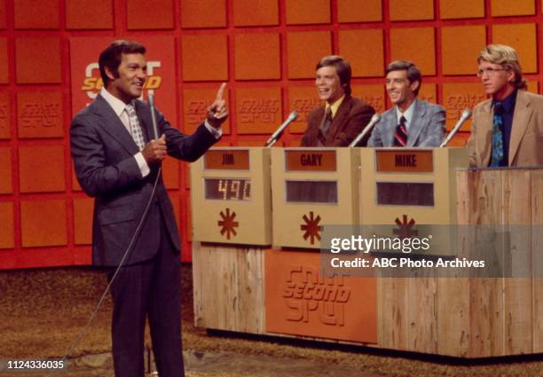 Tom Kennedy hosting with contestants on the Walt Disney Television via Getty Images game show 'Split Second'.