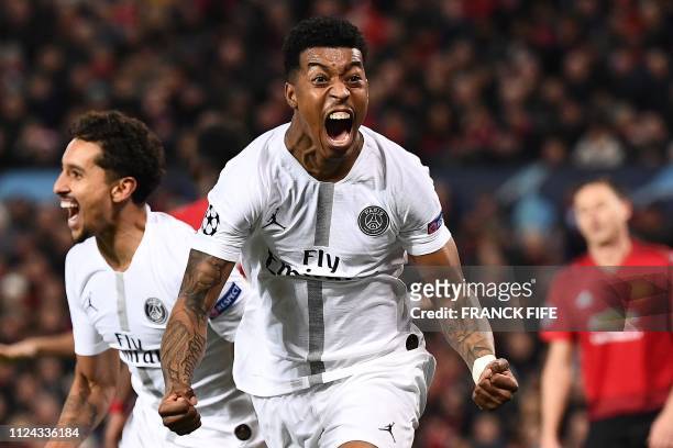 Paris Saint-Germain's French defender Presnel Kimpembe celebrates scoring the opening goal during the first leg of the UEFA Champions League round of...