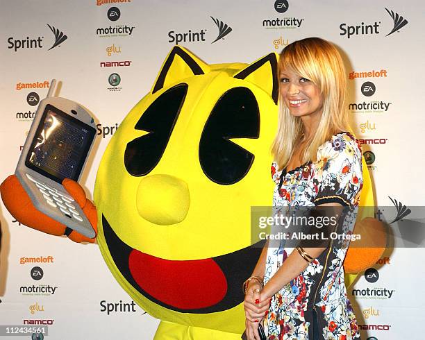 Nicole Richie with Super Pacman during 2006 E3 Convention - Day One at The Los Angeles Convention Center in Los Angeles, CA, United States.