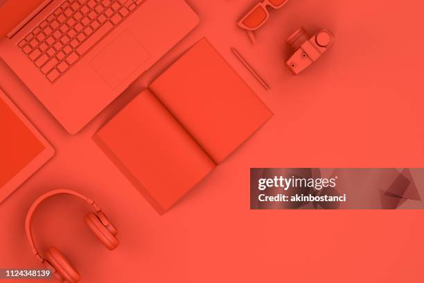 top view of red workplace with laptop and smart phone technology concept. - blank pages in open book overhead view stock pictures, royalty-free photos & images