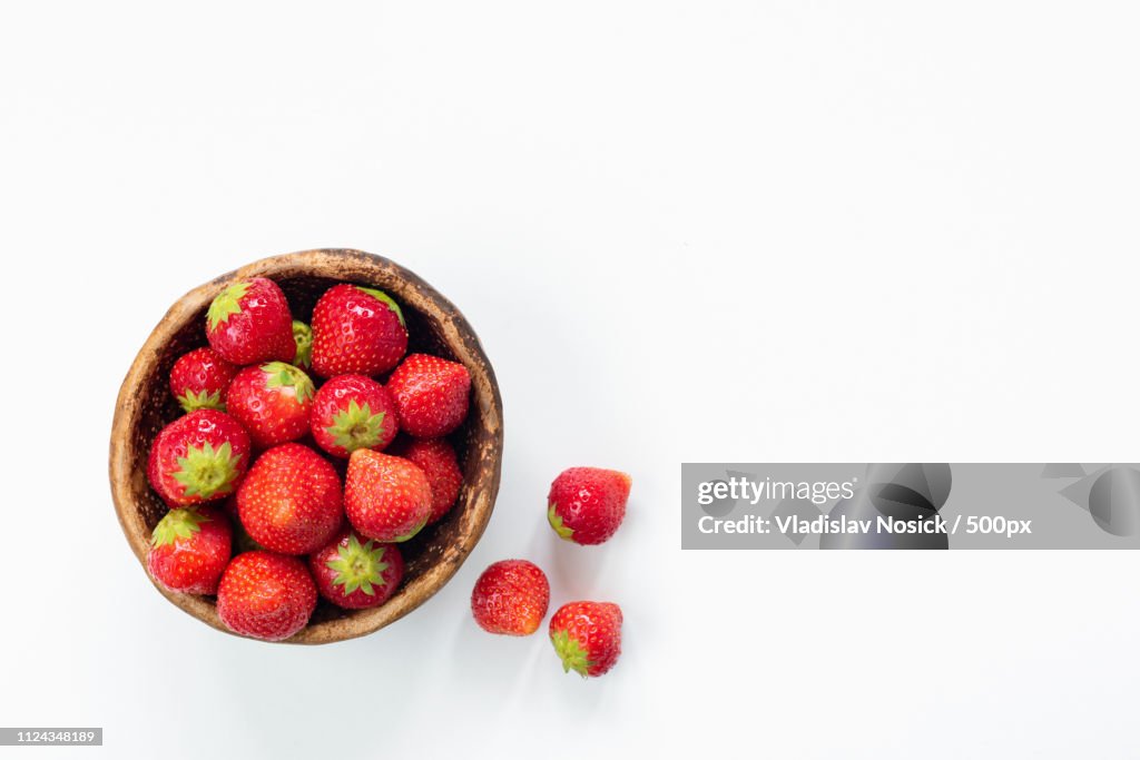 Strawberries In Bowl On White Background