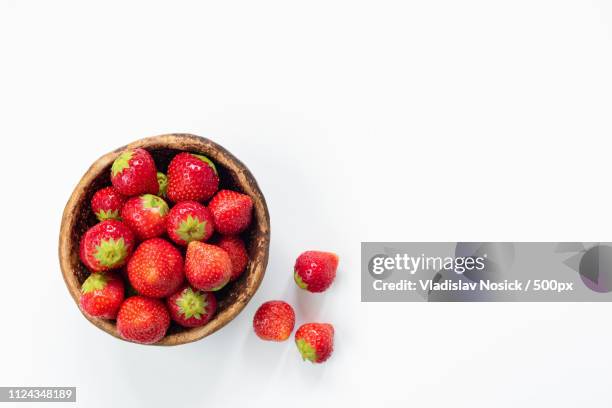 Strawberries In Bowl On White Background High-Res Stock Photo