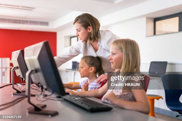 Kids Computing Lab 2,573 Computer Lab Kids Stock Photos, High-Res Pictures, and Images ...