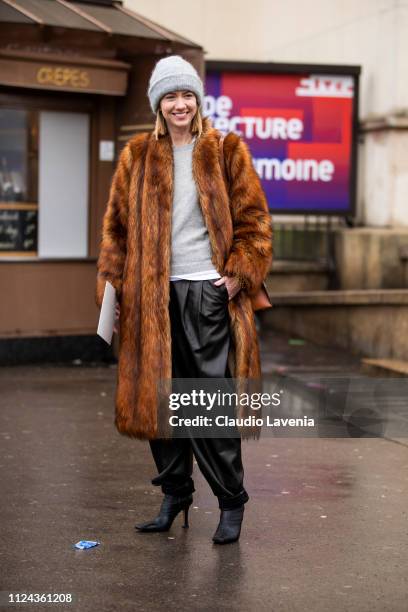 Lisa Aiken, wearing a grey jumper, black leather pants, black heels, grey hat and brown fur coat, is seen outside Elie Saab show during Paris Fashion...