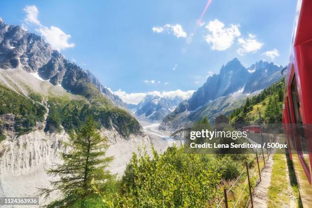 traveling to high french alps in summer - chamonix train stock pictures, royalty-free photos & images