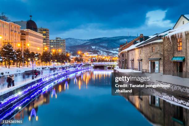 beautiful view of otaru canal at night, japan. - hokkaido city stock pictures, royalty-free photos & images