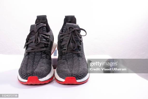 close up of men sport shoes on white background. - pair stock pictures, royalty-free photos & images