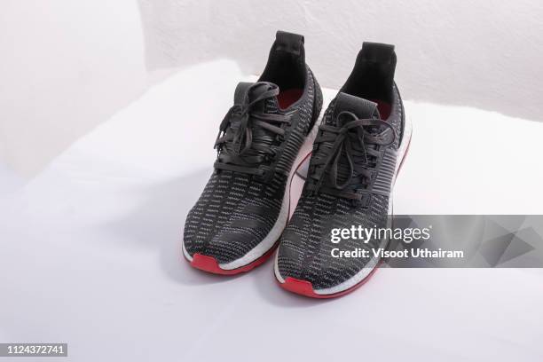 sport shoe on white background. - pairs stock pictures, royalty-free photos & images