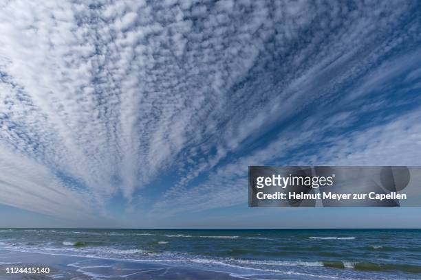 cloud cover (altocumulus) over the baltic sea, mecklenburg-western pomerania, germany - altocumulus stock pictures, royalty-free photos & images