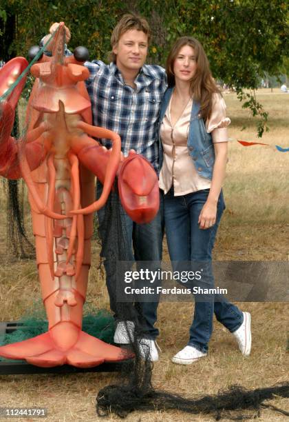 Jamie Oliver and Jools Oliver during "Peter Pan" Characters Wander Kensington Gardens for Great Ormond Street Hospital - July 23, 2005 at Kensington...
