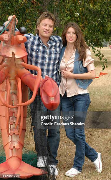 Jamie Oliver and Jools Oliver during "Peter Pan" Characters Wander Kensington Gardens for Great Ormond Street Hospital - July 23, 2005 at Kensington...