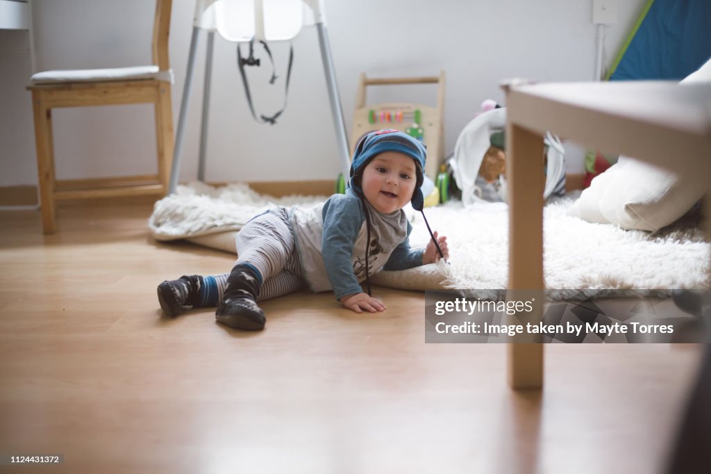 Baby On Rug Baby Boy Laying On A Rug High-Res Stock Photo - Getty Images