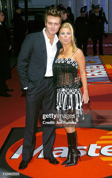 Bryan McFadden and Kerry McFadden during The 2004 Brit Awards - Arrivals at Earls Court in London, Great Britain.