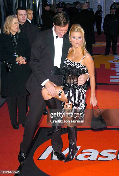 Lord Brockett and Kerry McFadden during The 2004 Brit Awards - Arrivals at Earls Court in London, Great Britain.