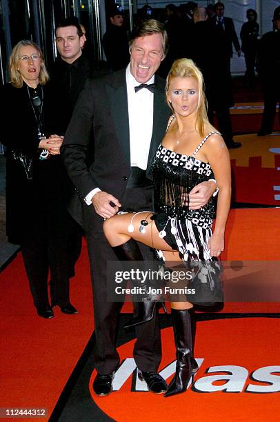 Lord Brockett and Kerry Mc Fadden during The 2004 Brit Awards - Arrivals at Earls Court in London, Great Britain.