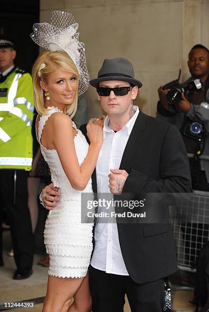 Paris Hilton and boyfriend Benji Madden arrive at Selfridges to launch her new perfume 'Can Can' on May 15, 2008 in London, England.