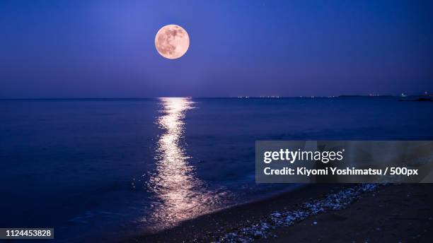 strawberry moon - strawberry moon stock pictures, royalty-free photos & images