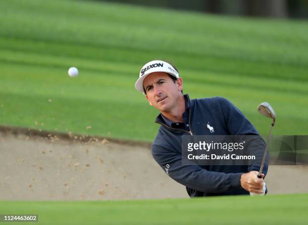 Gonzalo Fdez-Castano of Spain plays his third shot on the par 4, second hole during the first round of the Omega Dubai Desert Classic on the Majlis...