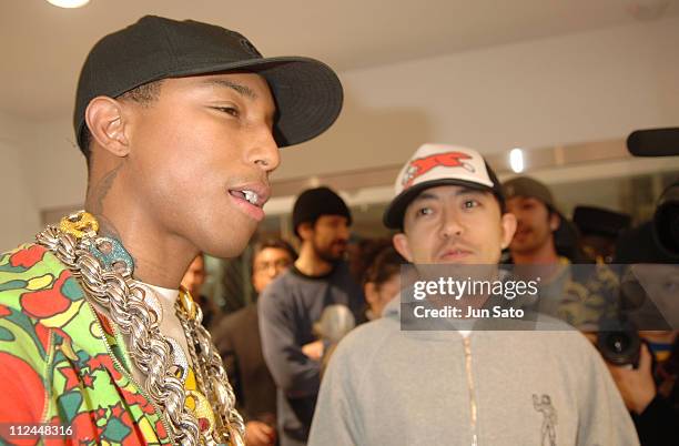 Nigo & Pharrell Williams photographed by Jun Sato during the Grand Opening  of “The Ice Cream Store” in Tokyo, Japan - November 04, 2005