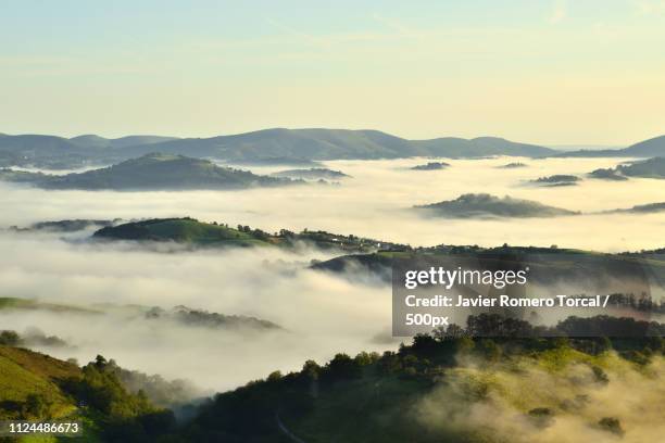 foggy mountains - saint jean pied de port stock-fotos und bilder