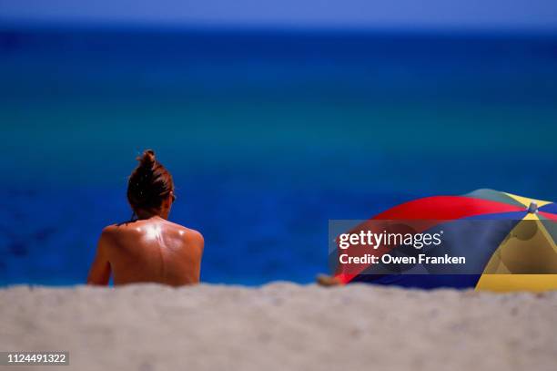 sunbather at st. tropez, cote d'azur, france - semi dress stock pictures, royalty-free photos & images