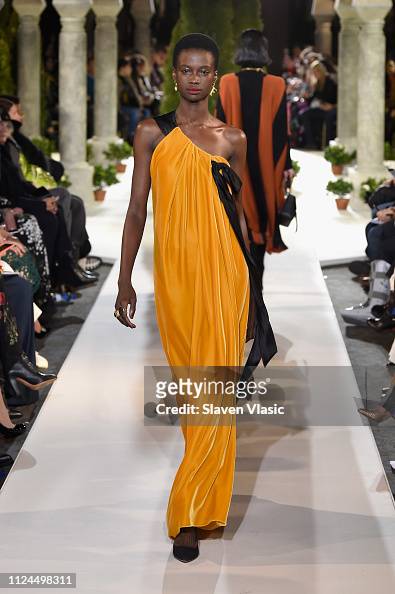 A model walks the runway at Oscar De La Renta during New York Fashion ...