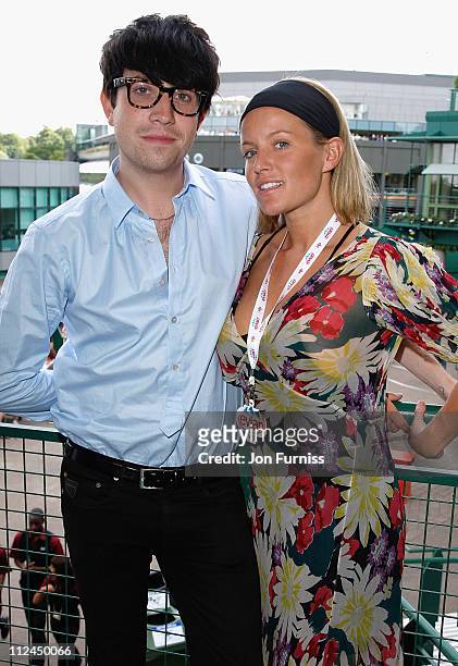 Nick Grimshaw and actress Davinia Taylor on the balcony of the Evian VIP Suite during the Wimbledon Championships 2008 at the All England Club on...