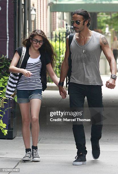 Lourdes Leon walks with her father Carlos Leon on the upper westside of Manhattan on June 30, 2008 in New York City.