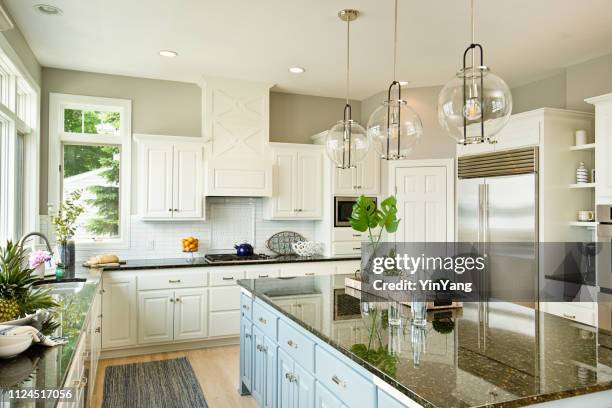 modern kitchen design with open concept and bar counter - newly opened stock pictures, royalty-free photos & images