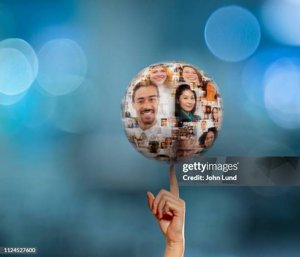 social media success at your fingertips - large group of people icon stock pictures, royalty-free photos & images