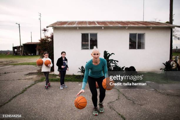 bald mother basketball coach