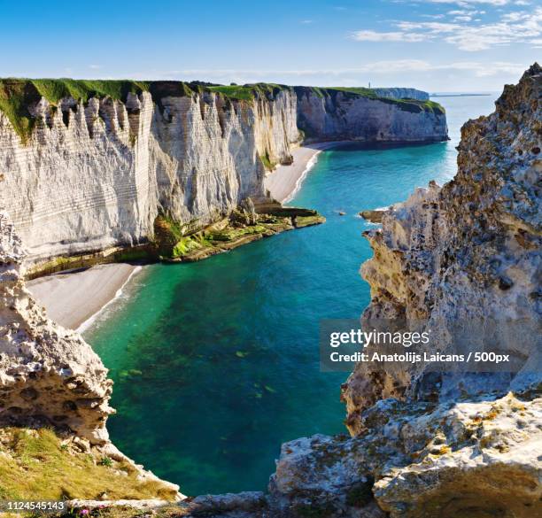 amazing rocky coastline of etretat france - dwejra stock pictures, royalty-free photos & images