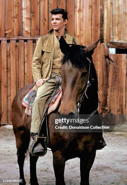 Actor and singer Frankie Avalon poses for a portrait on the Warner Bros lot during the filming of 'Guns of the Timberland' in 1959 in Burbank,...