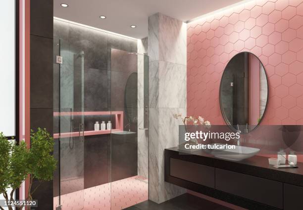 contemporary bathroom with light pink honeycomb tiles - bathroom tiles stock pictures, royalty-free photos & images