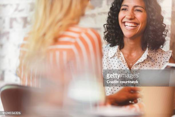 business colleagues having a conversation. - interview event stock pictures, royalty-free photos & images
