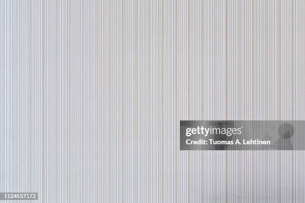 high resolution full frame background of pale and beige colored striped wallpaper. - 薄い ストックフォトと画像