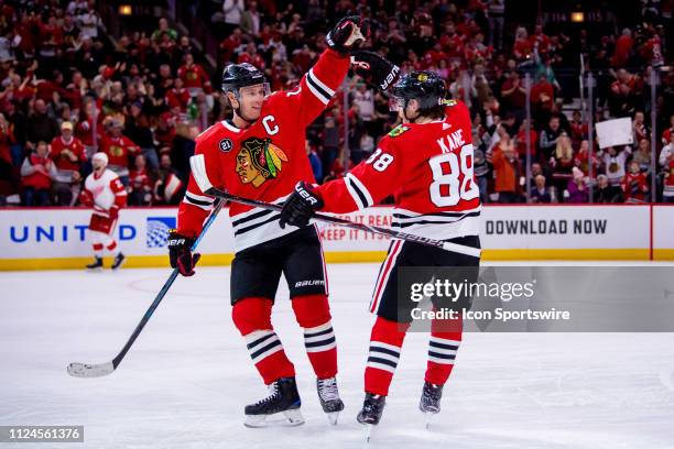 Chicago Blackhawks right wing Patrick Kane celebrates his goal with center Jonathan Toews during a game between the Detroit Red Wings and the Chicago...