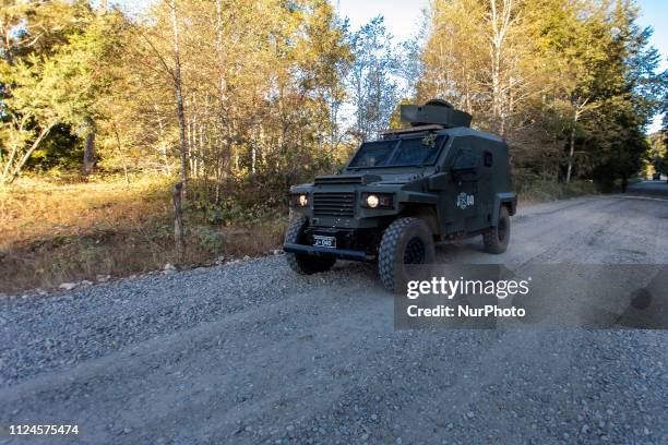 Cunco, Chile. 11 Frebuary 2019. Police cars guard the roads. Members of the GOPE take care of the work done by the MOP and monitor the Mapuche...