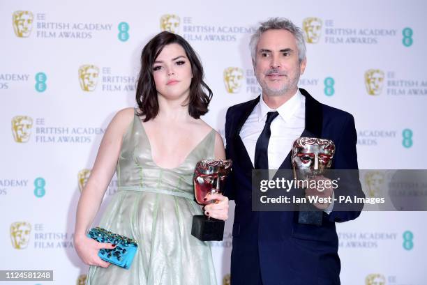 Alfonso Cuaron and Daughter Tess Bu Cuaron with his Best Film and Best Director Bafta's in the press room at the 72nd British Academy Film Awards...