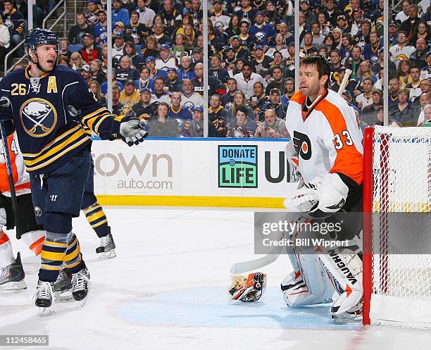 Thomas Vanek of the Buffalo Sabres protests the stoppage of play after goaltender Brian Boucher of the Philadelphia Flyers removed his mask in Game...