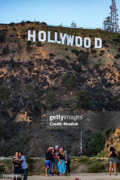 hollywood sign and tourists - hollywood boulevard stock pictures, royalty-free photos & images