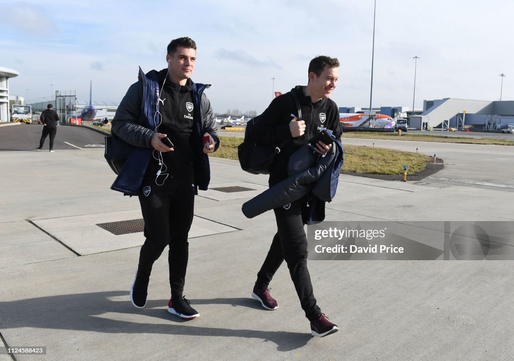 Arsenal Players Board the Plane to Minsk
