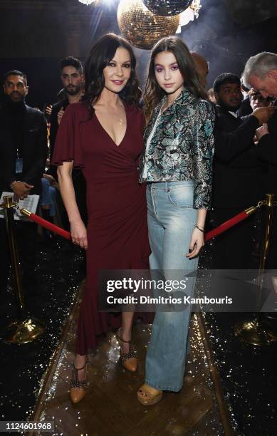 Catherine Zeta-Jones and Carys Zeta Douglas attend the Michael Kors Collection Fall 2019 Runway Show at Cipriani Wall Street on February 13, 2019 in...