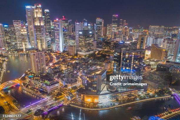 aerial view panoramic of the singapore skyline and marina bay, the marina is the centre of the economy in singapore, there are here all the building in singapore central - merlion park singapore stock pictures, royalty-free photos & images