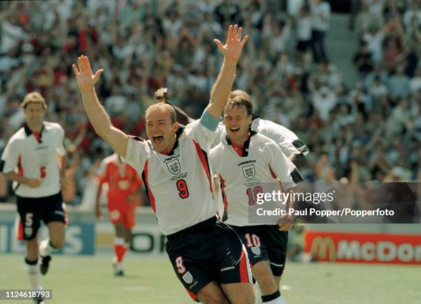 Alan Shearer of England celebrates after scoring during the 1998 FIFA World Cup Group G match between England and Tunisia at the Stade Vélodrome on...