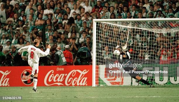 David Batty of England sees his crucial penalty saved in the shoot-out by Carlos Roa of Argentina during a 1998 FIFA World Cup 2nd Round match at the...