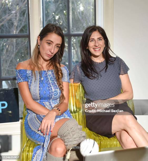 Lauren Francesca and Christine Lusita pose with her book "The Right Fit Formula" at TAP- Giveback Day on January 24, 2019 in Los Angeles, California.