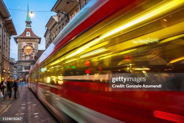 markgasse street and clock tower in bern - bern clock tower stock pictures, royalty-free photos & images